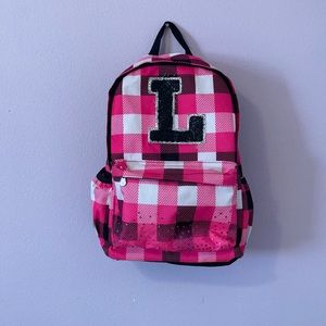 Justice pink backpack